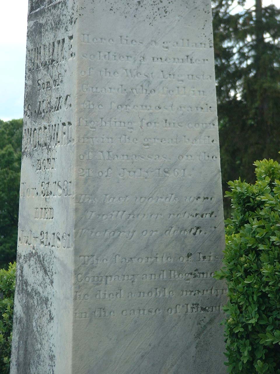 Inscriptions on a monument to William E. Woodward